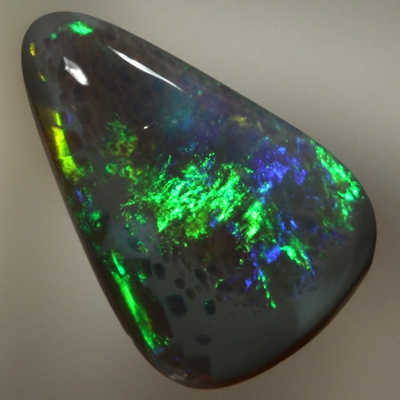 SOLID BLACK OPAL Bright fire. Green rolling flashes
